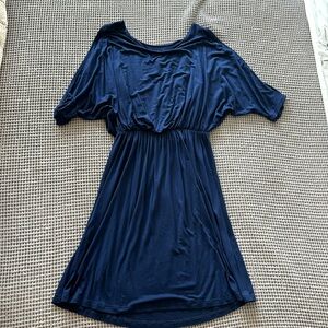 Gilli Small navy blue dress.  Cutout for shoulders. Cinched waist. Knee length.